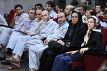Reuters – French language teaching assistant Clotilde Reiss (R) sits next to an Iranian policewoman and other defendants … 