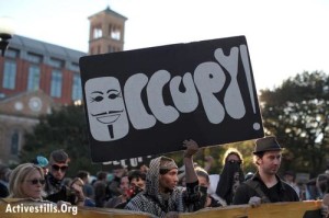 From Occupy to Wikileaks, the anarchist spirit of leaderless resistance, decentralized decision-making and autonomous self-governance, is rising. Photo: Tess Scheflan/Activestills.org