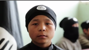 Uighur child soldiers fighting for ISIL in Syria. The CIA sees him as a future terrorist fighting against Chinese forces on the streets of Urumchi, the capital of the Xinjiang-Uighur Autonomous Republic.